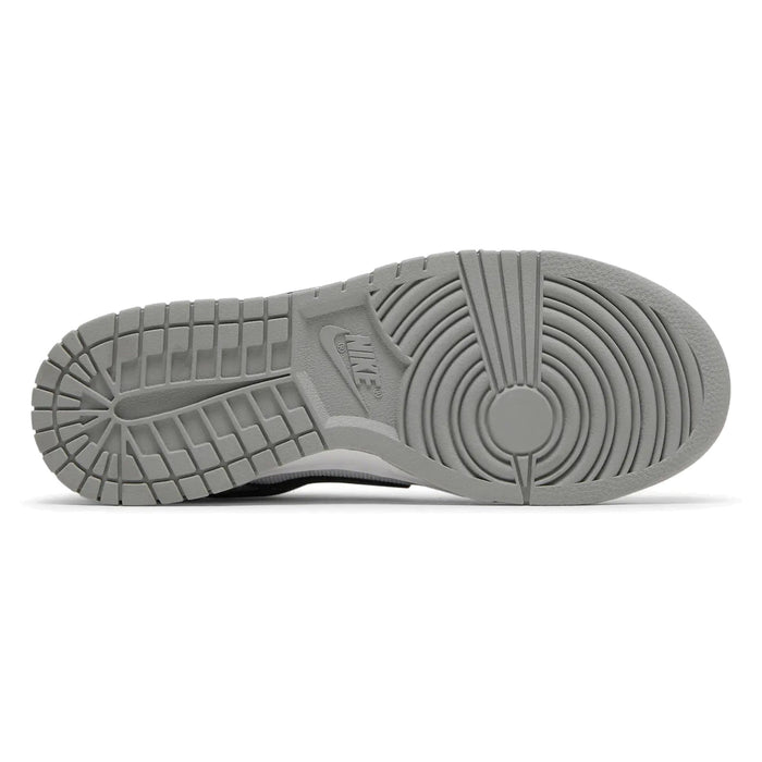 Gray sole of a sneaker on a white background
