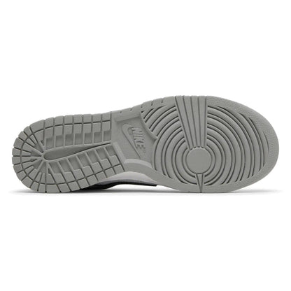 Gray sole of a sneaker on a white background