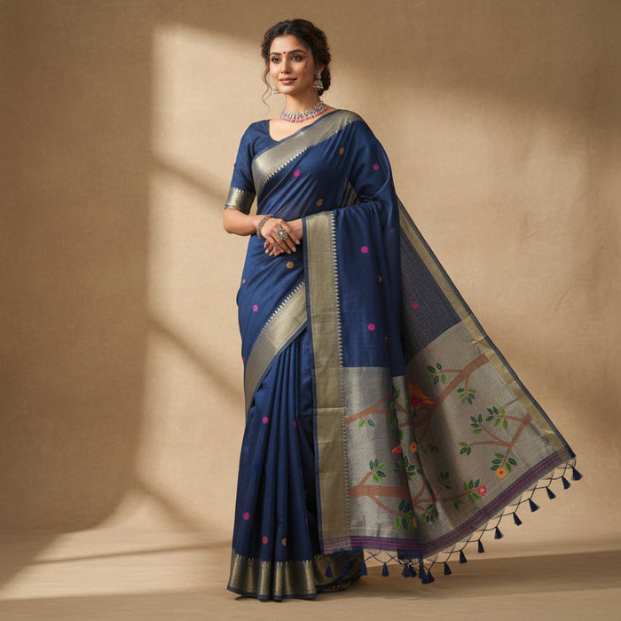 Blue saree with colorful bird design on a light background